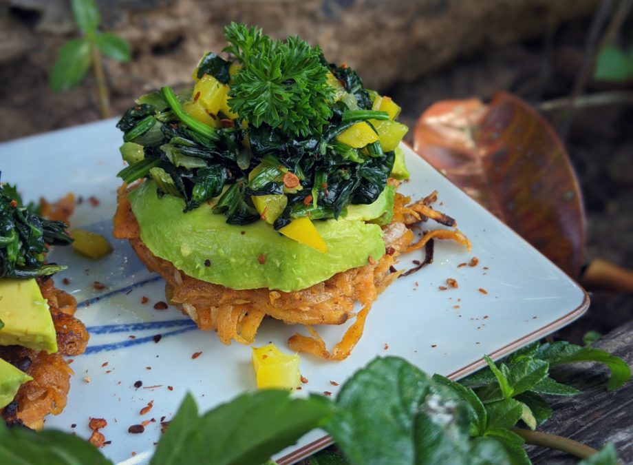 Vegan sweet potato hash browns with spinach and avocado
